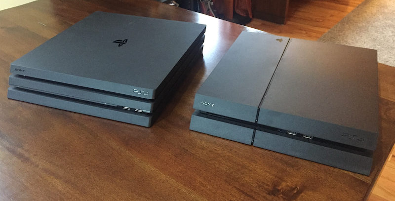 On the right, an original PS4. On the left, the Pro. The footprint is basically the same, the Pro is just a little taller.